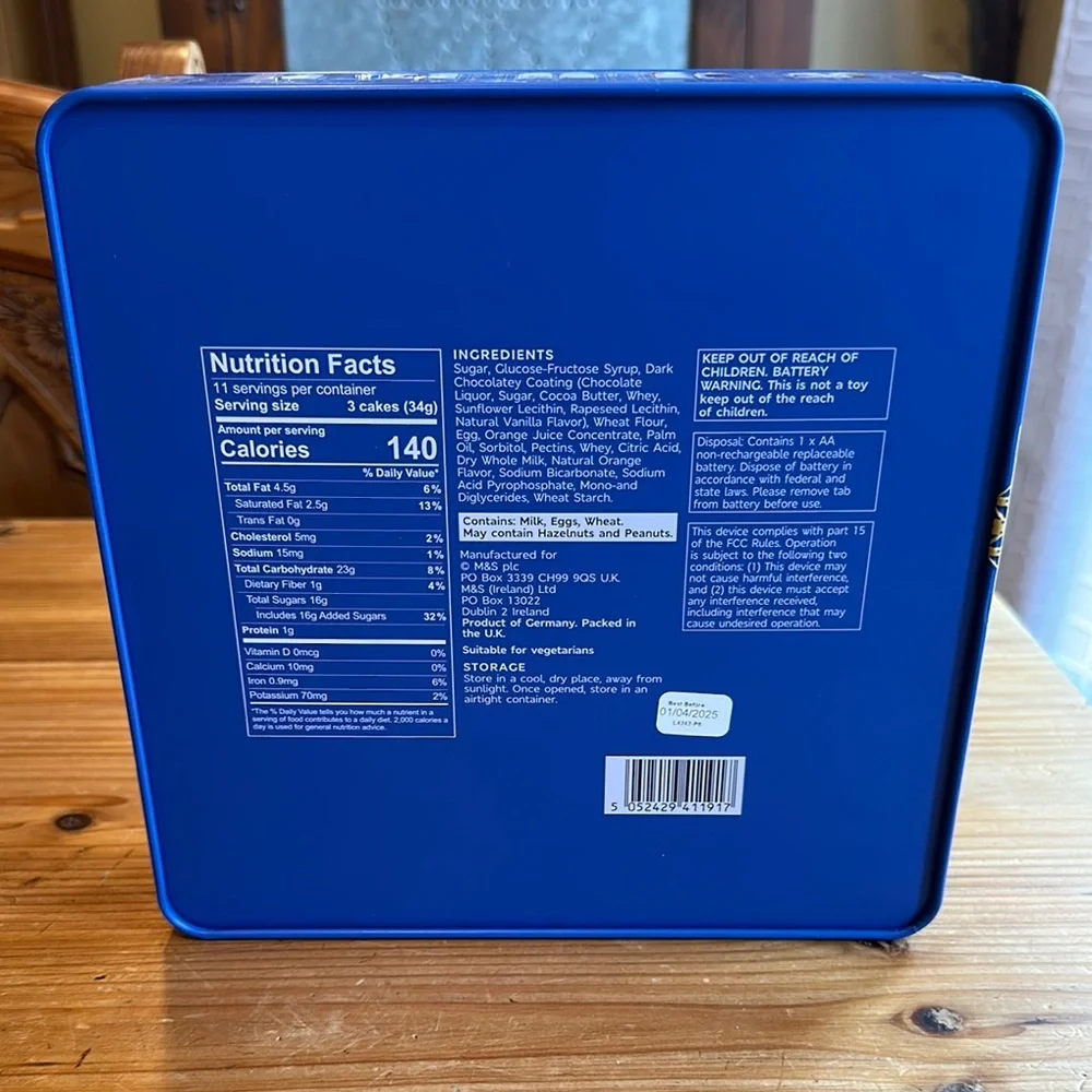 Marks and Spencer Blue and White Tin Clock